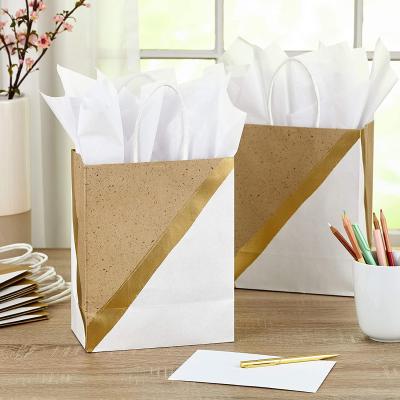 China Custom Luxury Retail Materials Clothing Bag Recycled Printing Shopping Gift Bag Kraft Paper Bag With Handles for sale