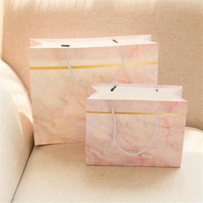 China Cheap Logo Luxury Brown Thick Card Board Recyclable Custom Sack Plain Paper Bags With Handles for sale