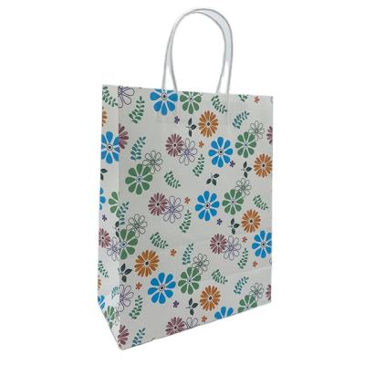 China Manufacturer Recyclable China Wholesale Custom Printing Logo Kraft Paper Shopping Bags with Hot Handles for sale