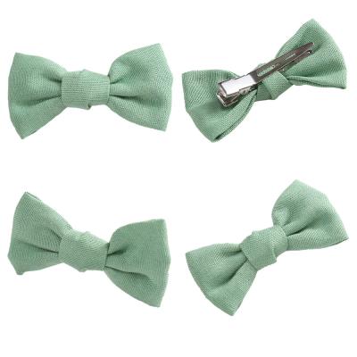 China Fashion Yiwu Central Institute of Statistics news solid color hairpins accessories small fresh bow girls hairpin clip fashion hot sale straight side children for sale