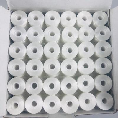 China Elastic High Tenacity White Color 75d Paper Sided L Type Polyester Embroidery Bobbin Thread for sale