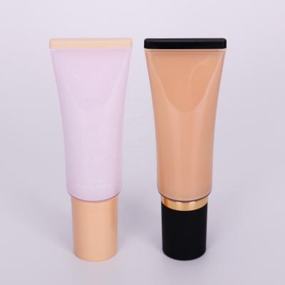 China Silk Screen Printing Cosmetic Glossy Cosmetic Plastic Tube With Flip Top Cap For Face Cream Packaging for sale