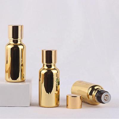 China 2021 Competitive Price Cosmetic Luxury Gold New Arrival Unique Empty 20ml Essential Oil Bottle With Packing Boxes for sale