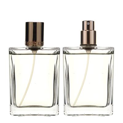 China Simple Design Cube Cosmetic Cheap Glass Round Cut Out Cap 50ml Artistic Glass Refillable Perfume Bottle Mini Glass Perfume Bottle 50ml for sale