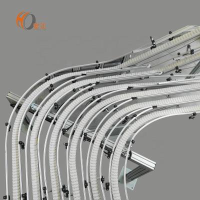 China XM63 XL83 103mm Oil Resistant Plastic Food Grade Chain Conveyor Flexible System Design For Cloth for sale