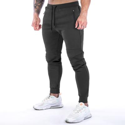 China Anti-wrinkle Europe and the United States cross-border muscle fitness exercise the new men's back towel small leg training pants for sale