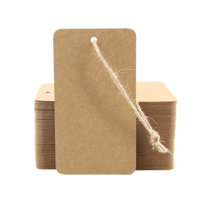 China Eco - Friendly Sustainable Recycle Customized Brown Kraft Paper Hang Tags For Clothing And Packaging for sale