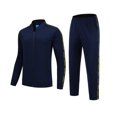 China Sports Polyester Anti-UV Black And Gold Comfortable Mens Football Tracksuits For Adults for sale