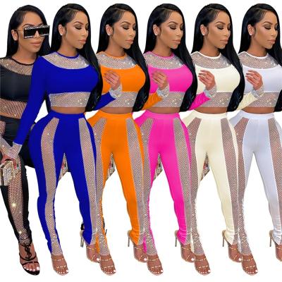 China Spring 2022 Breathable Through 2 Mesh See Clothes Crop Top Long Sleeve Set Women Tops Pants Jogger Fashionable Two Piece Set for sale