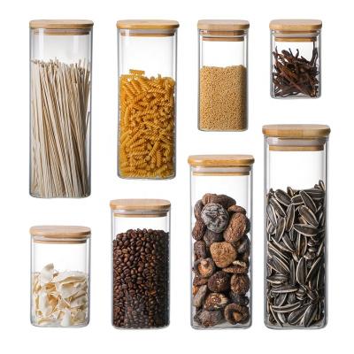 China Microwavable Glass Spice Jars Airtight Glass Storage Canister With Bamboo Lid for sale