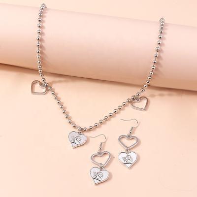 China Wholesale Durable Necklace Earrings Set Fashion Heart Cupid Necklace Dangle Earrings Women's Jewelry Set for sale