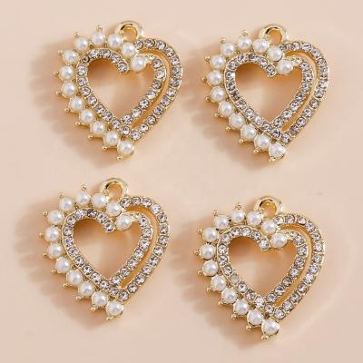 China 4pcs/bag Exquisite Durable Pearl Cavity Love Heart Pendants Crystal Bracelet DIY Necklace Earrings Shape Jewelry Charms Pendants for sale