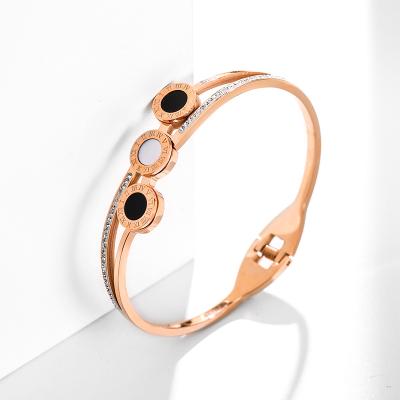 China Fashion Stylish Women Rose Gold Plated Titanium Steel Non Allergic Roman Number Bangle Zircon for sale