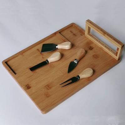 China Sustainable bamboo cheese board set with slate cheese board and tool holder, includes 4 cheese knives for sale