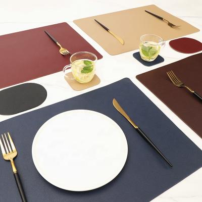 China New 2022 Nordic Oilproof Kitchen Dining Table Mat Custom Round Square Faux Leather Printed PU Leather Place Mat for sale