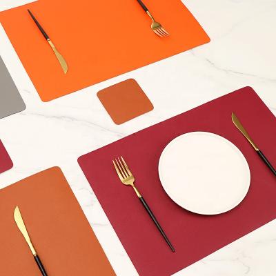 China NEW 2022 Stylish Dining Table Leather Mat Heat Insulation Placemat Oilproof PU Place Mat Protector 2022 for sale