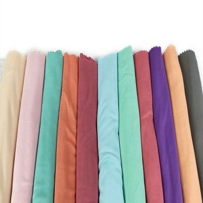 China Memory Naize Textile Milk Silk Dty 2 Side Brush PD Spandex Plain Dyed Fabric For Dress Tela DBP Knit Polyester Skirt for sale