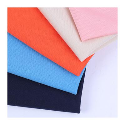 China Memory 100% Polyester Dyed Plain Knitted Multicolor Net Bird Eye Mesh Fabric for sale