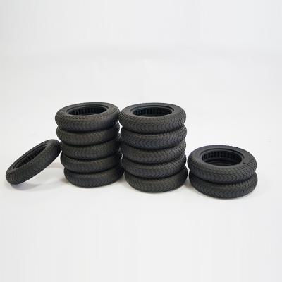 China Shock Absorption Design Tire 10x2.5 Wholesale Solid Electric Scooter Tire 10x2.0/2.5 With Hollow Out Inner for sale