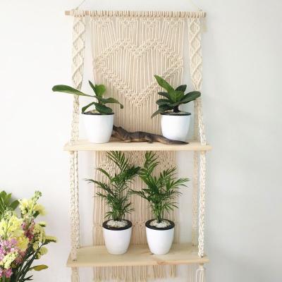 China 100% Double Woven Hanger Rope Pot Hanging Racks Handmade Wooden Shelf Wall Hanging Macrame Plant Decor With for sale