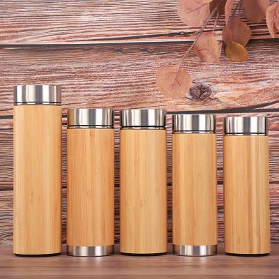 China Business Infuser Bottle Vacuum Insulated Stainless Steel Travel Tea Tumbler Bamboo Thermos Bottle with Tea Infuser and Strainer for sale