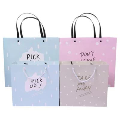 China Recycled materials hot sale custom design and printing cheap color paper bag shopping bag takeaway handbags wholesale for sale