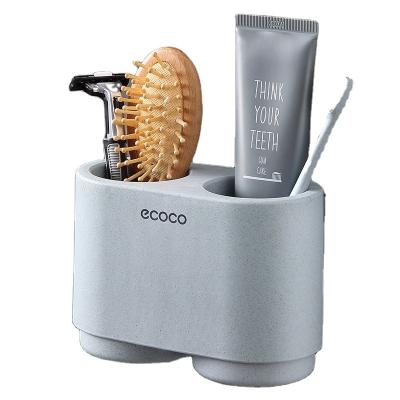 China 2022 Sustainable Creative Ecoco Mouthwash Cup Toothbrush Holder Set Magnetically Absorbent Toothbrush Holder for sale