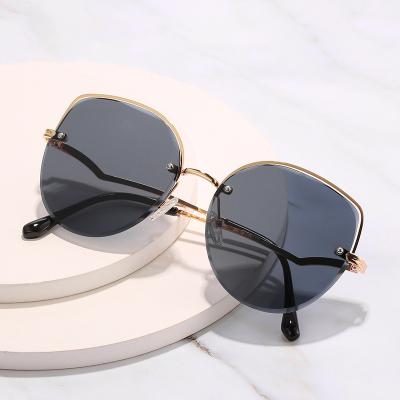 China Fashion Sunglasses Shape Rimless Glasses Driving Lenses Sale Custom Decorative Sunglasses For Ladies for sale