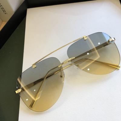 China Fashion Sunglasses Gradient Personality Glasses Metal Rimless Sunglasses With Big Frames for sale