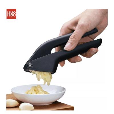 China Viable Kitchen Hand Tool Garlic Presser Garlic Presser Kitchen Multi Cutter Squeeze Tool for sale