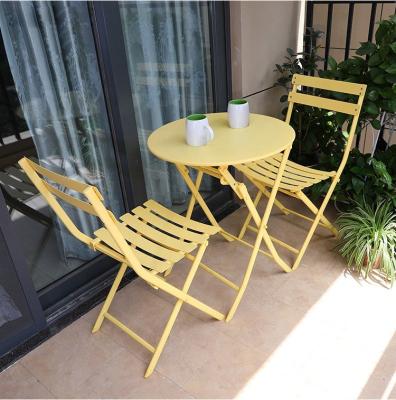 China Resistance garden sets balcony iron frame wihte/pink/green/blue chairs and tables folding furniture colorful chair foldable for sale