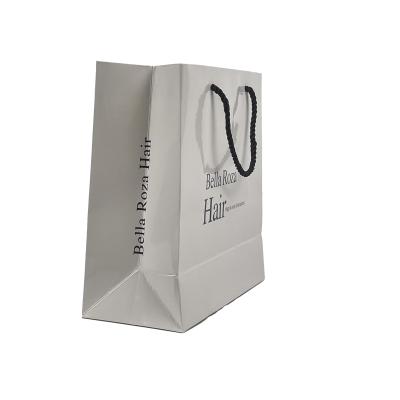 China Recyclable Customize Luxury Shopping Carry Packaging Gift Hair Extension Paper Bags With Logo Print for sale