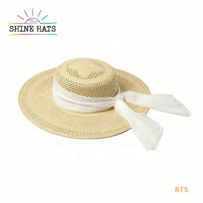 China 2021 Luxury Flower Ribbon Flat Head Cowboy Sparta Character Design Soft Women's Beach Straw Hat for sale