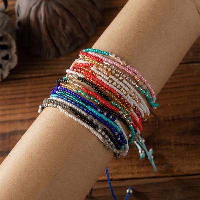 China Fashion Trendy Custom Adjustable Women Handmade Braided Rope Glass Beads Adjustable Rope Bracelet for sale