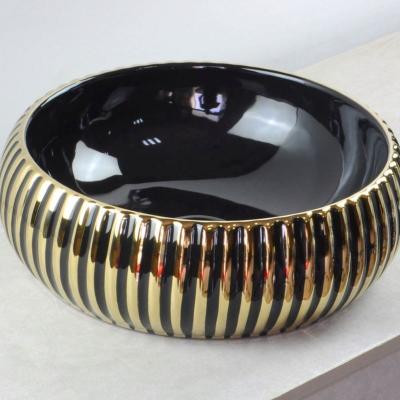 China New Pattern Easy Clean Decorative Round Sinks Bowl Table Top Bathroom Sink Gold Porcelain Plated Wash Basin for sale