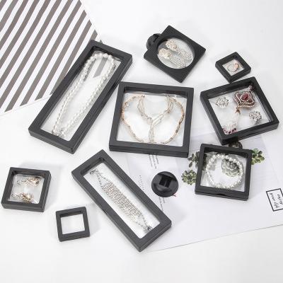 China Custom Floating 3D Frame Plastic Show Dustproof Acrylic Transparent Jewelery Packaging Box Antioxidation Jewelry Box For Necklace for sale