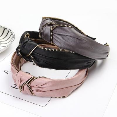 China Korean Version WT1057A Vintage Finish Perfect Solid-color Headbands Alloy Zipper Leather Headbands Cross Wide Knotted Hair Bands for sale