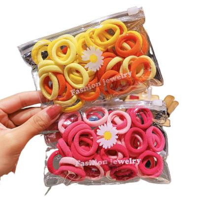 China 100 Pieces Hair Decoration WT057B Hair Accessories Contrast Color Korean Style Nylon Hair Circle Head Simple Rope Women's Soft Circle for sale