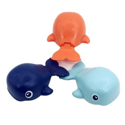 China New Design Eco-friendly Material ABS Material Cute Cartoon Whale Plastic Wind Swimming Whale Baby Bath Toys for sale