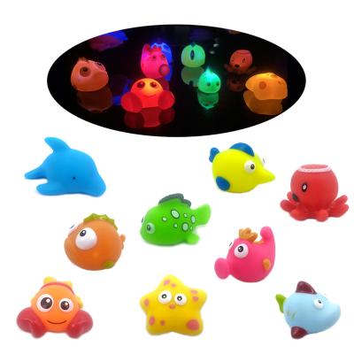 China Flashing Kids LED Bathtub Floating Dolphin Kids LED Bathtub Dolphin PVC Flashing Bath Rubber Floating Toys With Light Up Fish Octopus Toy for sale