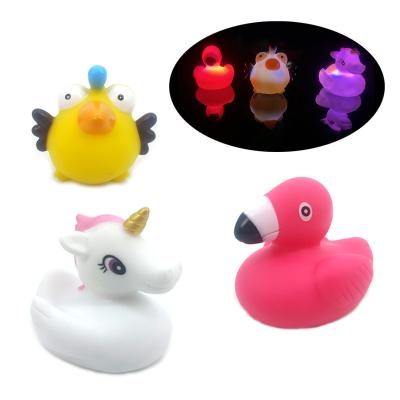 China PVC Bathtub Game Flamingo Toy Flamingo Baby Bath Toys With LED Light Up Flashing Bird Silicone Swimming Pool Toys for sale