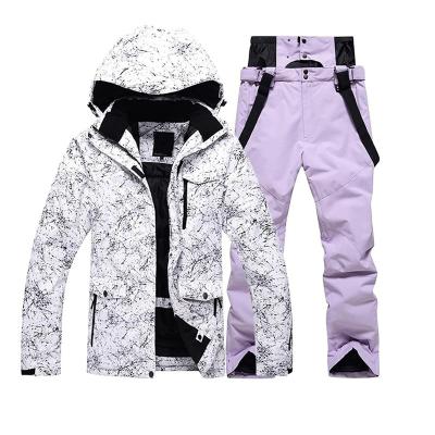 China FREE SAMPLE Breathable Women's High Quality Ski Suits Waterproof Snowboarding Windproof Colorful Printed Ski Jacket And Pants for sale