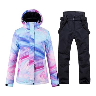 China Breathable Snowsuits FREE SAMPLE Women's Ski Suit Waterproof Snowboard Female Colorful Printed Ski Jacket and Pants Set for sale