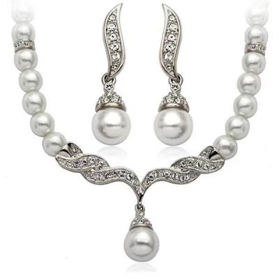 China High Quality Jewelry Set Korean Fashion Angel Wings Pearl Necklace Earring Set Jewelry Set Wedding Bridal Accessories for sale