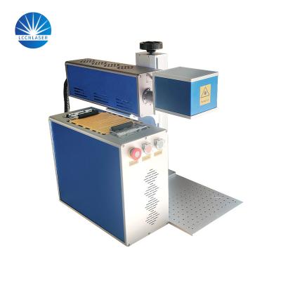 China Programmable Flying CO2 Metal Laser Tube Marking Machine For Plastic PET Bottles Assembly Line for sale