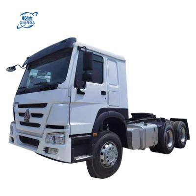 China Hot Sale Aluminum Alloy 2020 Truck SINOTRUCK SINOTRUK HOWO 420 Truck Head HOWO Heavy Duty Trailer Head White Diesel Tractor Engine Coarse Wheel for sale