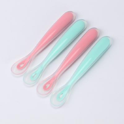 China BPA Free Candy Color Baby Kids Feeding Supplies Silicone Soft Spoon Tool Silicone Baby Feeding Spoon for sale