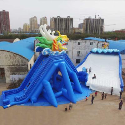 China Commercial mega dargon stormwater inflatable slide for adult water park swimming pool aqua park slide for sale