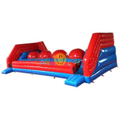 China Large Commercial Red Inflatable Big Bounce Ball Game Baller Wipeout Game For Sale for sale