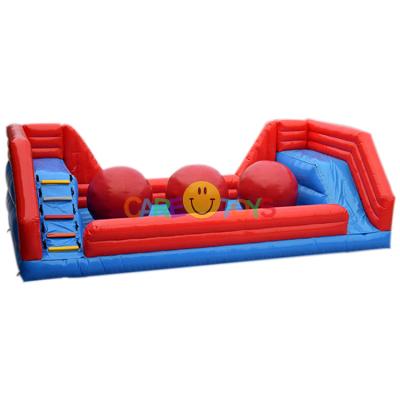 China Commercial big baller red wipeout 3 ball inflatable obstacle challenge game for sale for sale